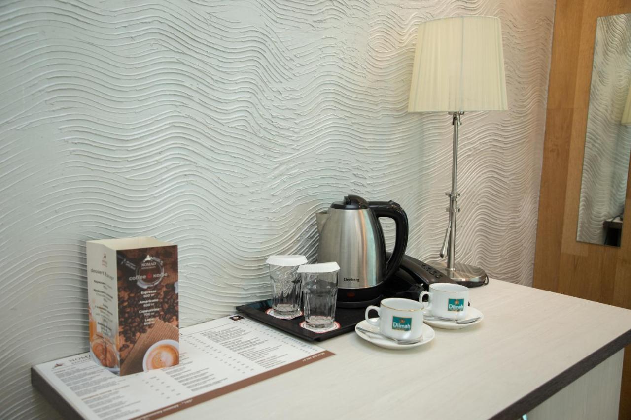 Astra Hotel الماتي المظهر الخارجي الصورة